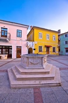 Town of Krk historic main square stone well view, Kvarner region of Croatia