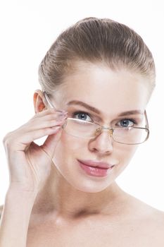 Portrait of young perfect woman in glasses isolated on white background