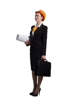 Young female engineer with suitcase in hardhat isolated on white