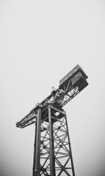 Industrial Shipbuilding Crane Against A Grey Sky With Copy Space