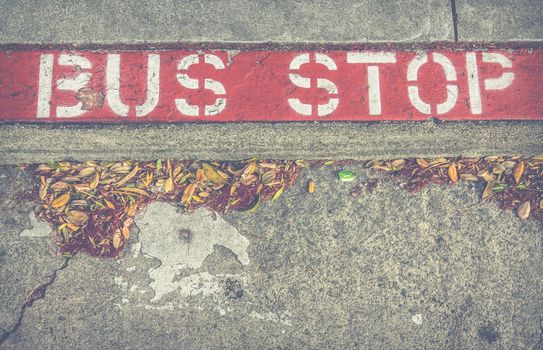 Old Bus Stop Sign On A Sidewalk In San Francisco