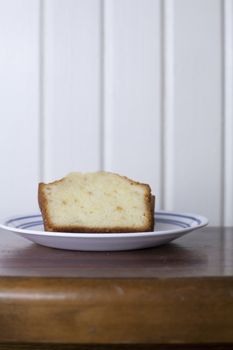 Multiple slices of pound cake on a small plate