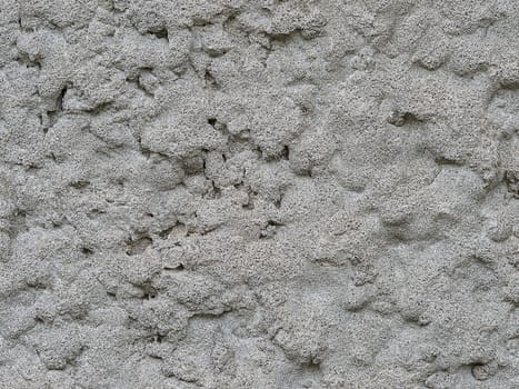 Surface of the wall plastered manually (closeup)