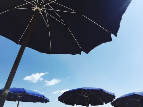 Beach umbrellas in a sunny day