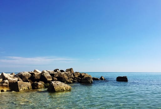 Rocky coastline in a bright summer day