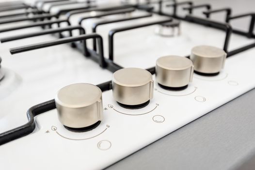 Brand new white gas stove macro closeup