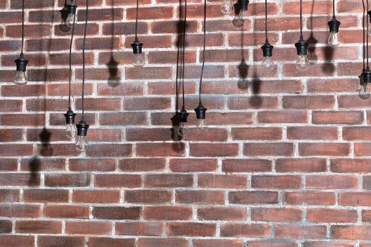 Brick wall with bulb lights lamp. nice brick show room with spotlights
