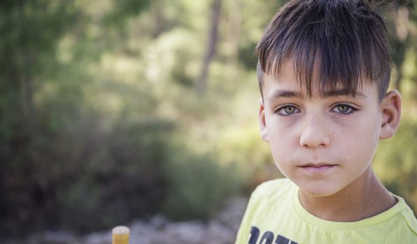 Boy with beautiful green eyes