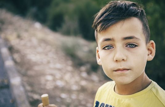 Boy with beautiful green eyes