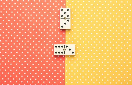 Domino pieces in a color background