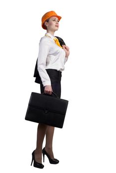 Young female engineer with suitcase in hardhat isolated on white