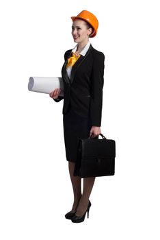 Young female engineer with suitcase in hardhat isolated on white