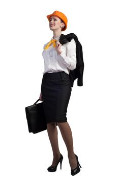 Young female engineer with suitcase in hardhat isolated on white