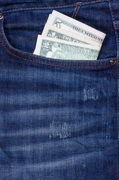 Some dollars in a pocket of jeans