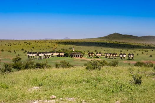 Hotel with huts on stilts in the savannah of Tsavo West park in Kenya