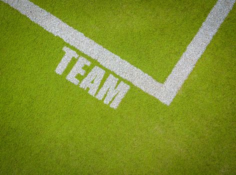 White Markings On A Sports Pitch Or Court Saying Team With Copy Space