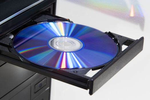 Colorful disc in player of a desktop computer