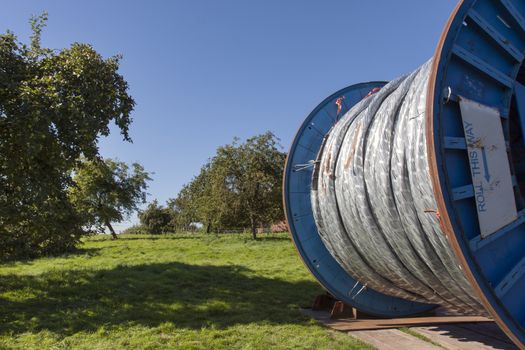 Big reel with cable in the countryside