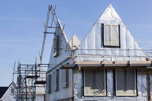 Construction site with houses with prefabricated walls in the Netherlands 