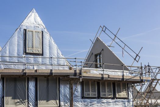 Construction site with houses with prefabricated walls in the Netherlands 