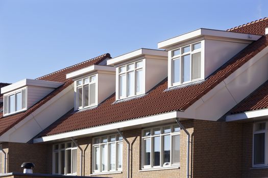 Red tiled roof with dormers in the Netherlands