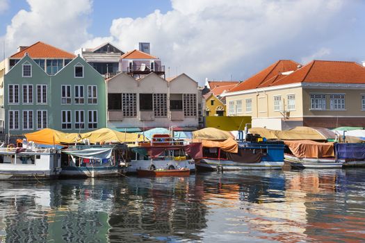 Colorful floating fruit market in Willemstad on Curacao