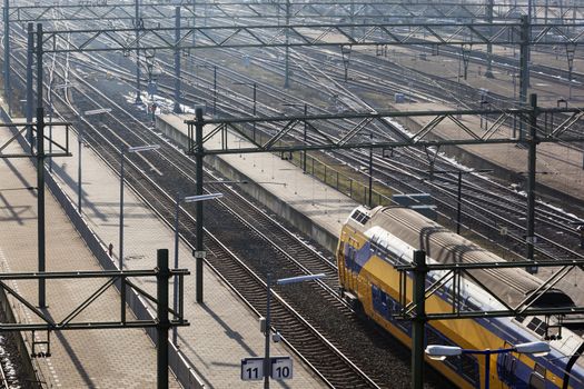 Train waiting for red light at the Hague central station in the Netherlands