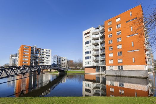 Apartment buildings and water in residential district Prinsenland in Rotterdam in the Netherlands