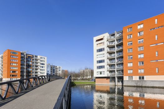 Apartment buildings and water in residential district Prinsenland in Rotterdam in the Netherlands