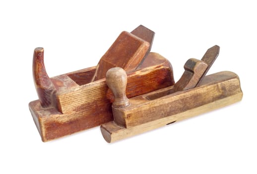 Two old wooden hand planes different purposes on a white background
