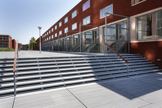 Modern neighborhood with metal pavement in the Katendrecht district in Rotterdam, the Netherlands