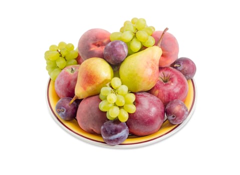 Several apples, pears, plums, peaches and clusters of white grapes on the big yellow dish on a white background

