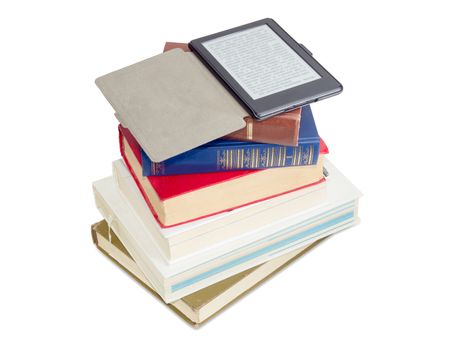 Ebook reader in an open case on a stack of ordinary paper books on a white background
