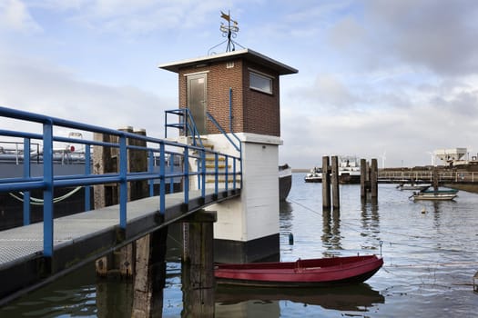 Harbor of Moerdijk with a small building in the Netherlands