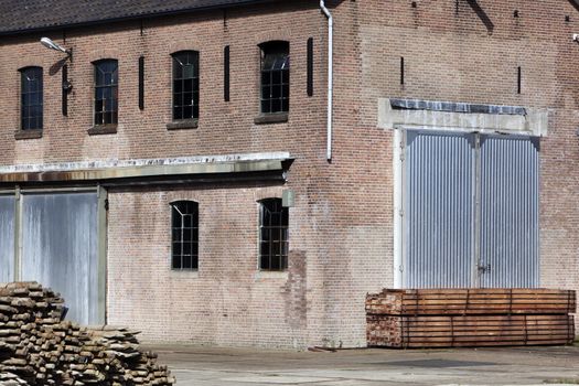 Vintage warehouse exterior and wood storage outdoors