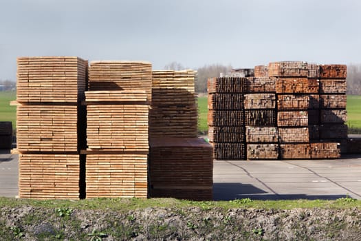 Industrial storage of piles wood for the construction industry