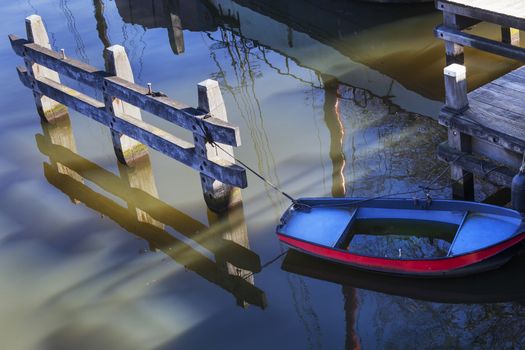 Moored metal rowing boat in the Netherlands