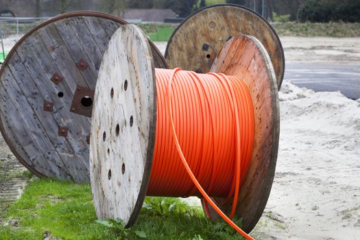 Industrial spools with orange cable in the Netherlands