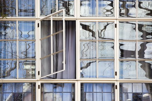 Traditional window of a mansion in Rotterdam in the Netherlands
