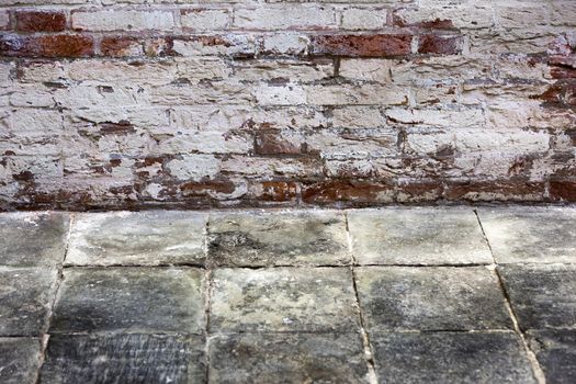 Vintage stone floor and brick wall interior