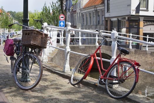 Bicycles near a canal in Delft in the Netherlands