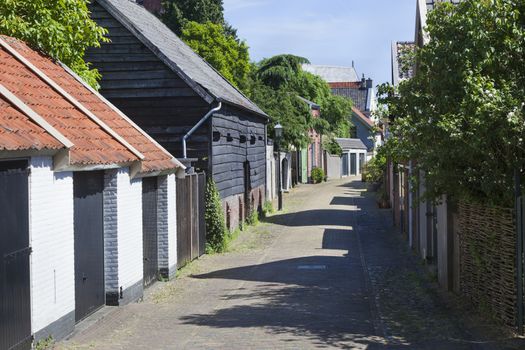 Old cozy street in Buren in the Netherlands