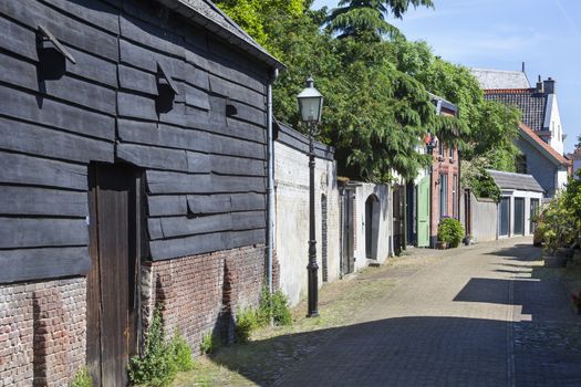 Old cozy street in Buren in the Netherlands