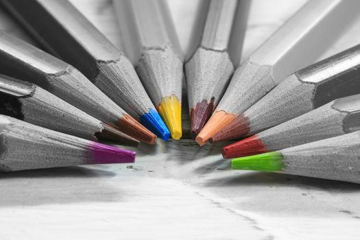 Group of color pencils in black and white