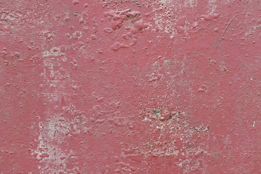 Rusty colorful red metal sheet as background picture
