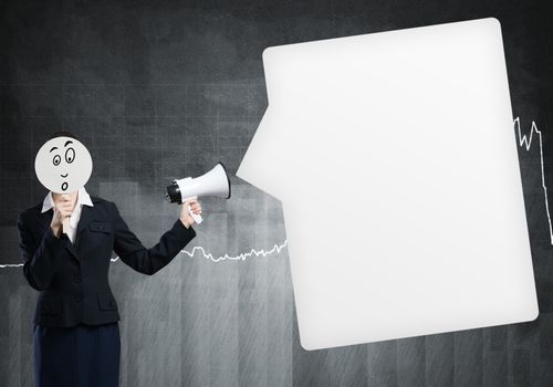 Unrecognizable businesswoman with megaphone and diagrams at background
