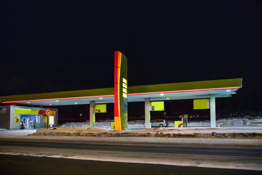 A view of the gas station at night