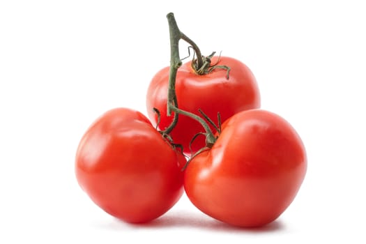 Red ripe tomatoes isolated on white background