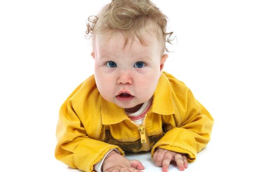 Baby in a yellow shirt isolated on white background