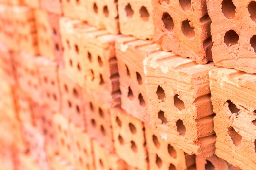 Closeup Group of blend red brick material for industry , selective focus